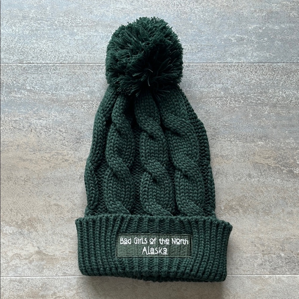 Bad Girls of the North, Alaska, Dark Green Cable Knit Beanie with Pom Pom